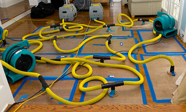 Professional Flood Damage Restoration technician working in Sisters, OR